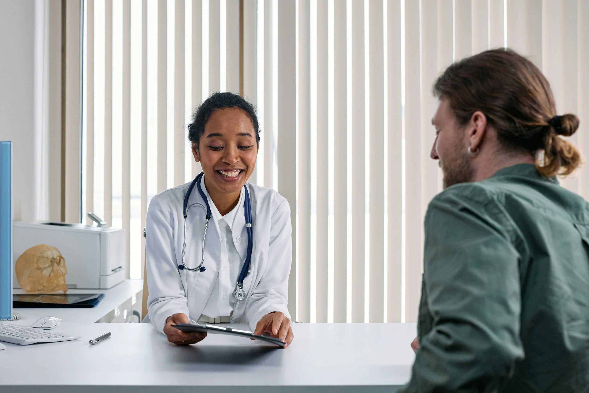 Clinician consulting a patient
